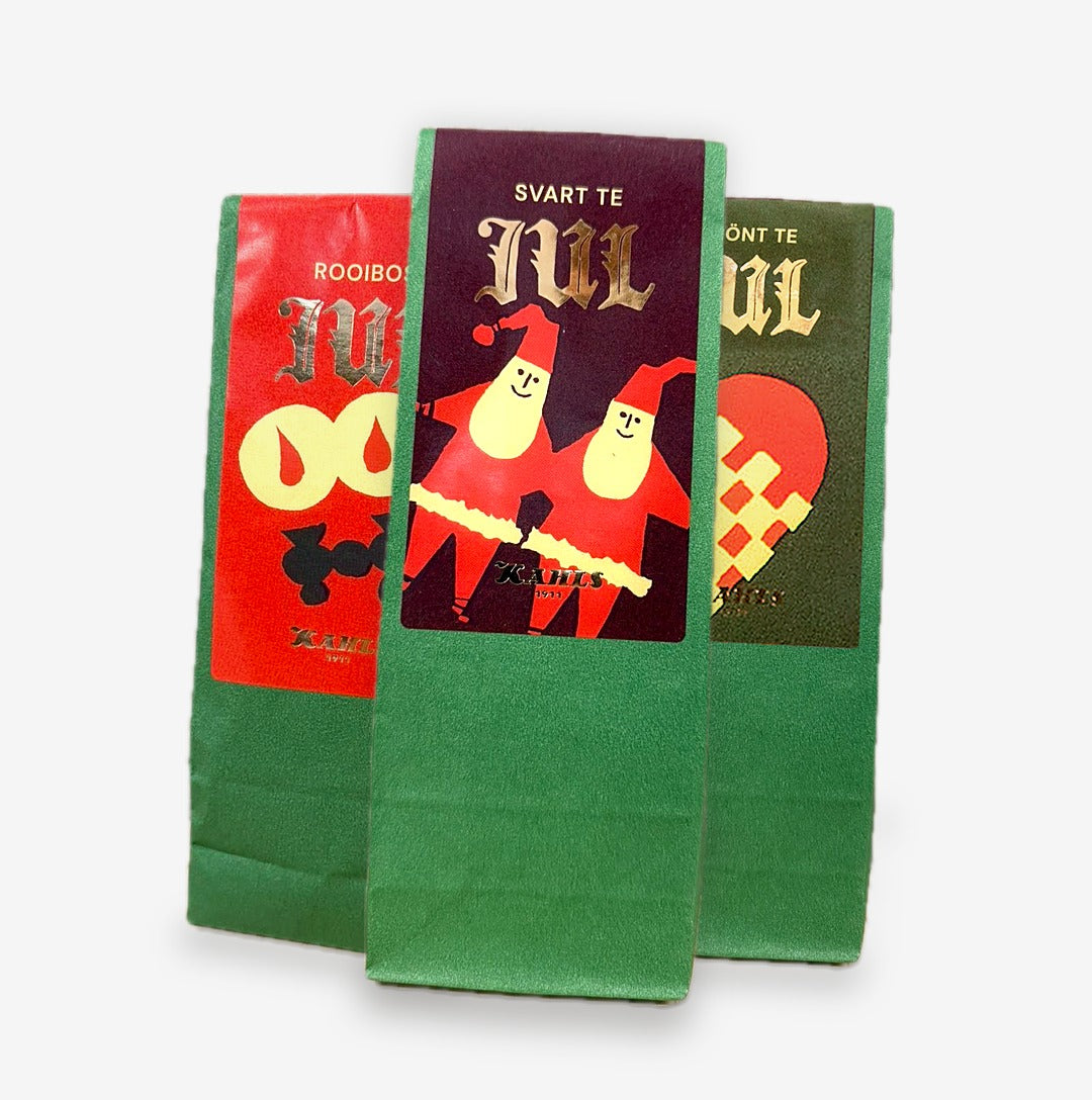 Jultepaket: svart julte fram, rooibos-julte och grönt julte bakom, 100 g var
